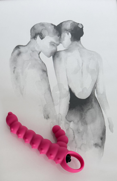 Pinker Vibrator mit Noppen