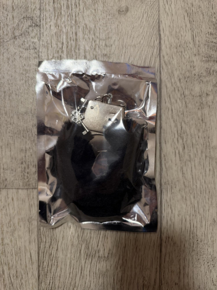 Plüschhandschellen in schwarz
